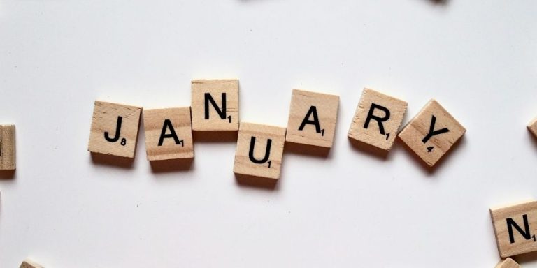 scrabble tiles spelling out the word January