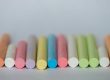 row of coloured chalks lined up neatly