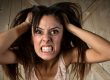 angry women pulling at her hair